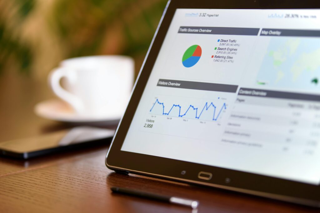 South African business owner reviewing email marketing analytics and results